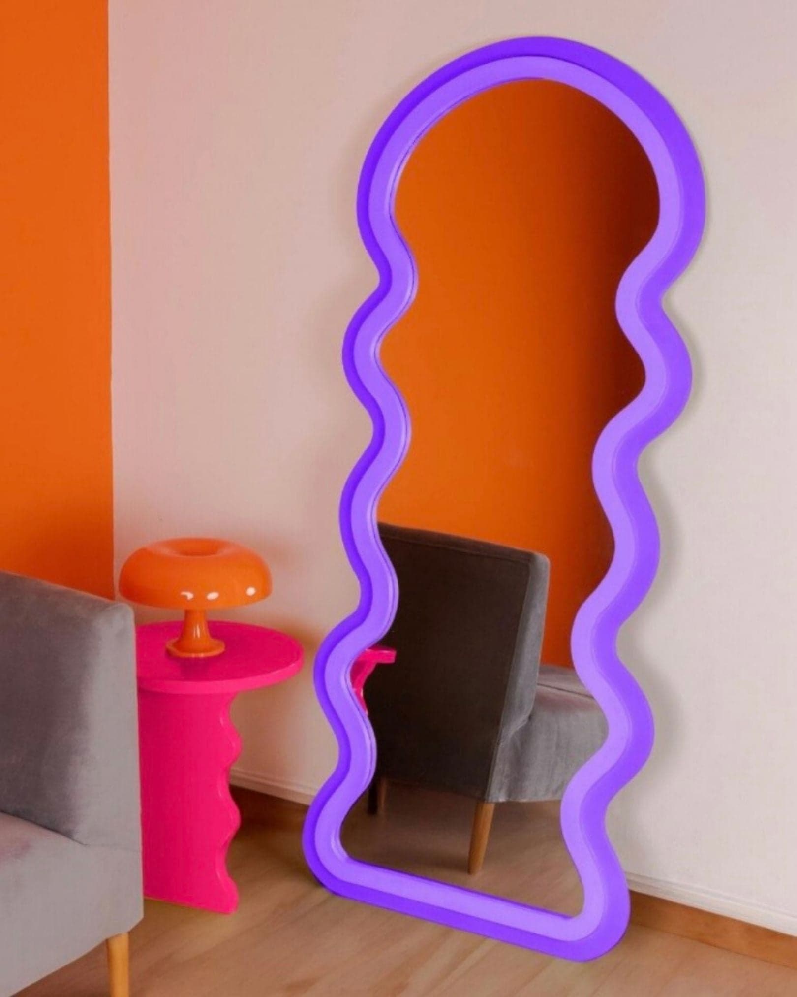 Bi Mirror — two-tone wavy mirror with a gradient frame